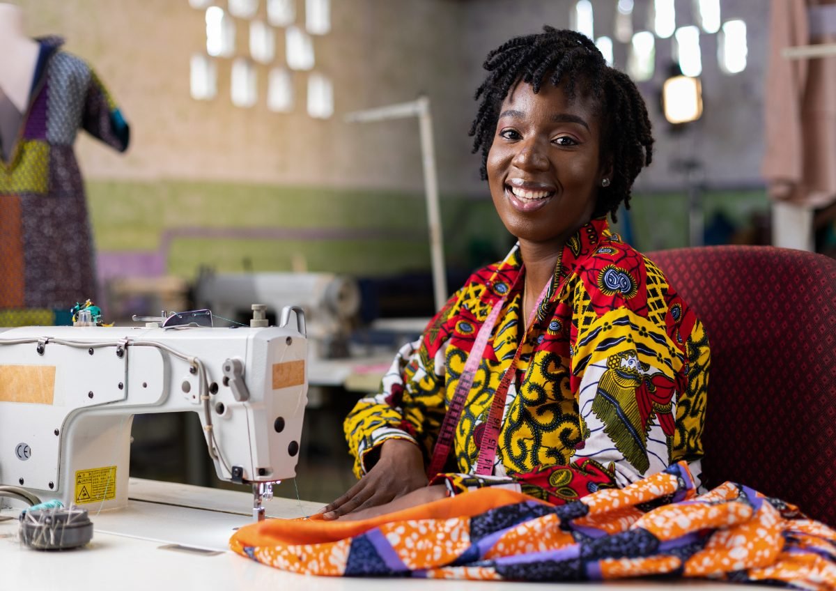 A tailor at work in her Kigali workshop